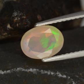 0.78 ct Multicolor Opal Gemstone, Opal Gem in Oval Facet Shape for Sale.