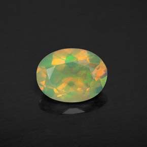 0.94 ct Multicolor Opal Gemstone, Opal Gem in Oval Facet Shape for Sale.