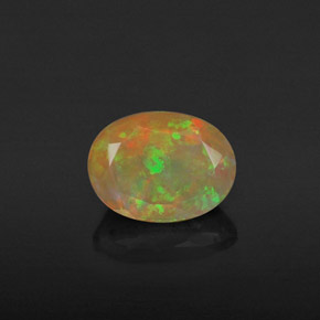 0.98 ct Multicolor Opal Gemstone, Opal Gem in Oval Facet Shape for Sale.