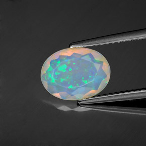 1.22 ct Multicolor Opal Gemstone, Opal Gem in Oval Facet Shape for Sale.