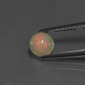 0.58 ct Multicolor Opal Gemstone, Opal Gem in Round Cabochon Shape for Sale.
