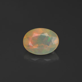 0.66 ct Multicolor Opal Gemstone, Opal Gem in Oval Facet Shape for Sale.