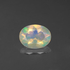 0.83 ct Multicolor Opal Gemstone, Opal Gem in Oval Facet Shape for Sale.