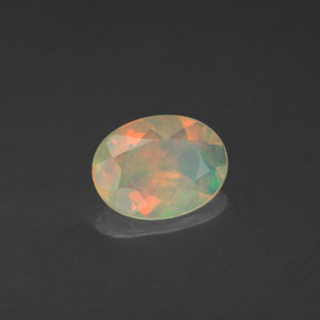 0.71 ct Multicolor Opal Stone, Natural Opal in Oval Facet Shape for Sale