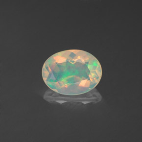 0.71 ct Multicolor Opal Gemstone, Opal Gem in Oval Facet Shape for Sale.