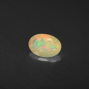 0.41 ct Multicolor Opal Stone, Natural Opal in Oval Facet Shape for Sale
