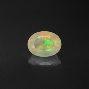0.85 ct Multicolor Opal Gemstone, Opal Gem in Oval Facet Shape for Sale.