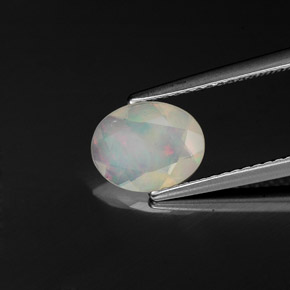 0.78 ct Multicolor Opal Stone, Natural Opal in Oval Facet Shape for Sale