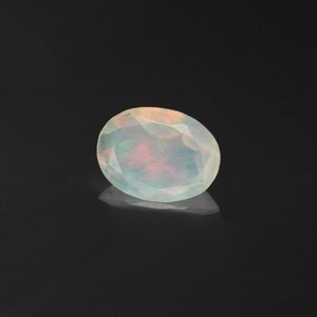 0.58 ct Multicolor Opal Gemstone, Opal Gem in Oval Facet Shape for Sale.