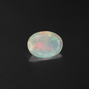 0.58 ct Multicolor Opal Stone, Natural Opal in Oval Facet Shape for Sale