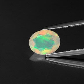 0.73 ct Multicolor Opal Gemstone, Opal Gem in Oval Facet Shape for Sale.