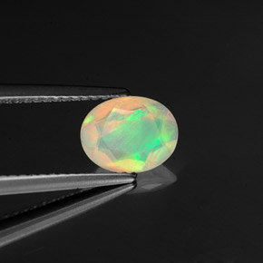 0.73 ct Multicolor Opal Stone, Natural Opal in Oval Facet Shape for Sale
