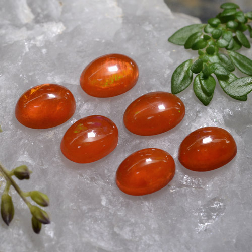 Deep Reddish Orange Opal Gem - 0.5ct Oval Cabochon (ID: 368952)