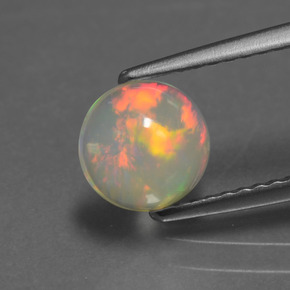 0.85 ct Multicolor Opal Gemstone, Opal Gem in Round Cabochon Shape for Sale.