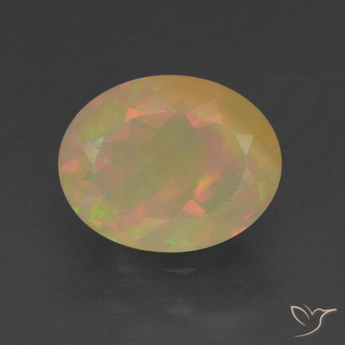Opale Multicolore Ovale 1,46 ct d'Éthiopie, Dimension 10,1 x 8mm, Pierre gemme naturelle Non traité, pureté Translucide, 1 pièce d'opale oval facet, dureté de Mohs de 5.5 à 6.5, Pierre du zodiaque Balance, Photo A