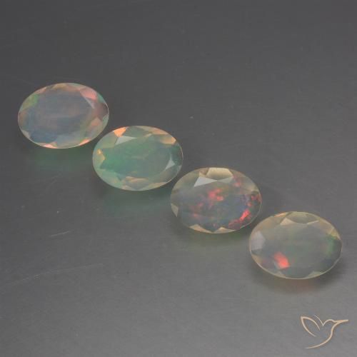 Lot de 4pcs Opales Multicolore d'Éthiopie - Poids total 1,32 ct / moyenne 0,33 ct chacune, taille 6,9 x 5mm, couleur : Multicolore, dureté de Mohs 5.5 à 6.5, Symbolise l'amour, la passion, le désir, Photo A