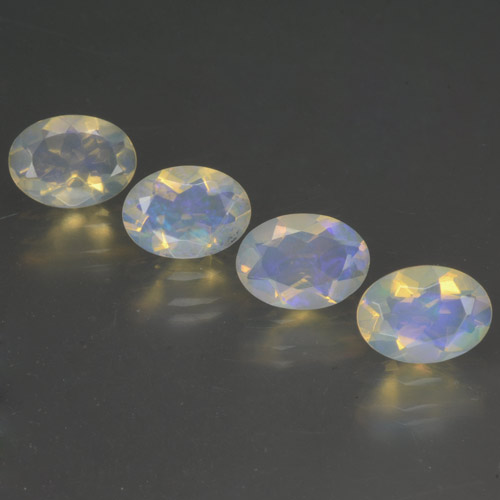 Bluish White Opal Gem - 0.5ct Oval Facet (ID: 462845)