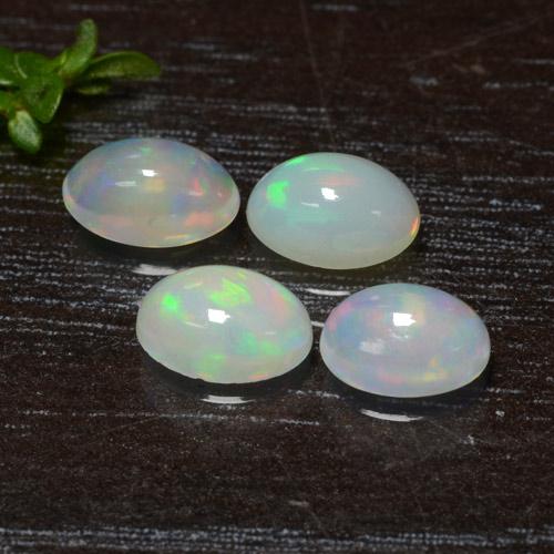 Lot of 4pc Oval Cabochon Multicolor Opal from Ethiopia - Size 6 x 4.1mm, Weight 1.23ct total / avg. 0.31ct each, Color: Multicolor, Mohs Hardness 5.5 - 6.5, Symbolizes Love, Passion, Desire, Photo A