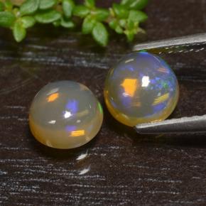 1.1ct Round Cabochon Yellow Opal for sale thumb image of 1.1ct Round Cabochon Yellow Opal (ID: 477293)