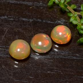 0.6ct Round Cabochon Yellow Opal Gem for sale 0.6ct Round Cabochon Yellow Opal Gem (ID: 477316)