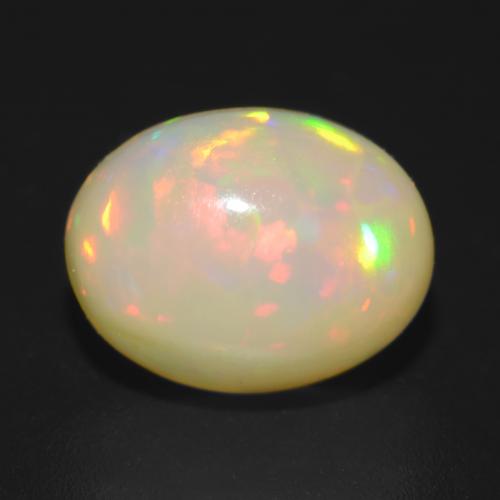 Opale Multicolore Ovale 9 x 7mm d'Éthiopie, poids de 1,48 ct, pierre gemme naturelle Non traité de pureté Translucide, 1 pièce d'opale oval cabochon, couleur : Multicolore, dureté de Mohs de 5.5 à 6.5, Pierre de naissance d'octobre, Photo A
