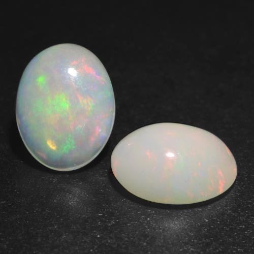Multicolor White Opal Edelstein - 1.1ct Oval Cabochon (ID: 540957)