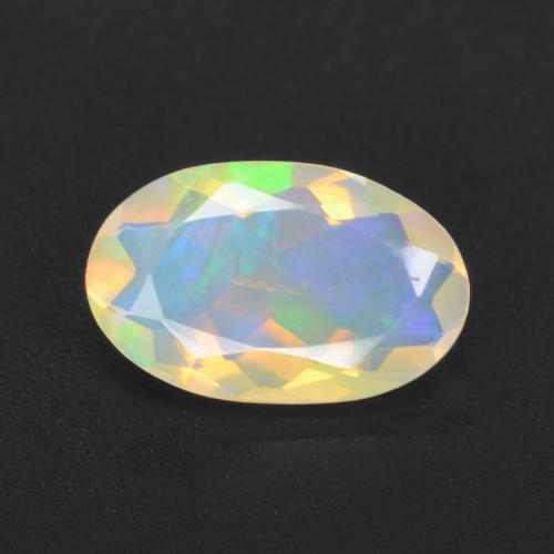 Opale Ovale sfaccettato da 0,93 ct dall'Etiopia, dimensione 9,9 x 6,2mm, purezza Transparent, pietra preziosa naturale non trattati, Opale 1pc in colore Multicolore, durezza Mohs di 5,5 - 6,5, Pietra zodiacale Bilancia, Photo A