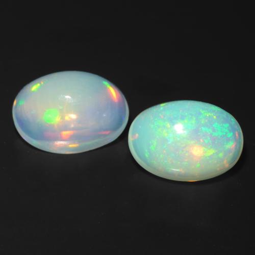 Paire d'opale Ovale 7,1 x 5,1mm - Poids total 1,26 ct / moyenne 0,63 ct chaque, pierre gemme naturelle Non traité, couleur Multicolore avec pureté Transparent, dureté Mohs 5.5 à 6.5, Pierre de Cupidon, Photo A