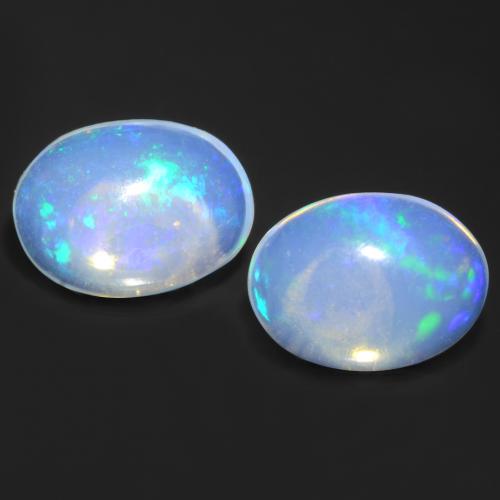 Multicolor Opal Gem - 0.8ct Oval Cabochon (ID: 548152)