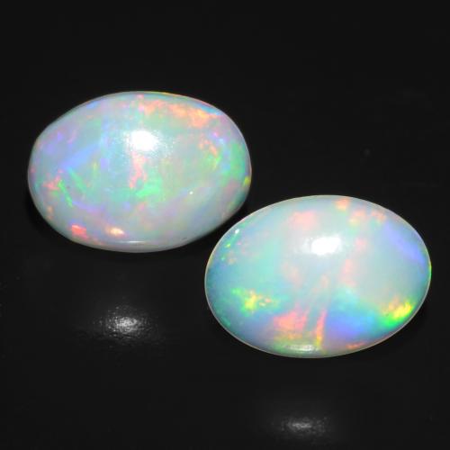 Multicolor Opal Gem - 0.5ct Oval Cabochon (ID: 548517)