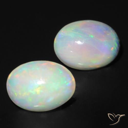 Paire d'opale Ovale 7,2 x 5,3mm - Poids total 1,11 ct / moyenne 0,56 ct chaque, pierre gemme naturelle Non traité, couleur Multicolore avec pureté Translucide, dureté Mohs 5.5 à 6.5, Année de la pierre précieuse du serpent, Photo A