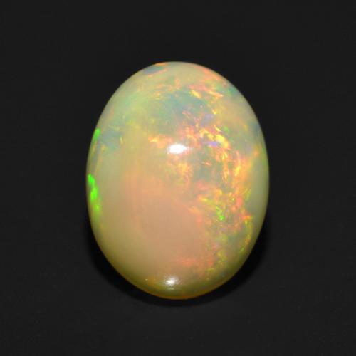 9.1 x 7.1mm Oval Multicolor Opal from Ethiopia, Weight of 1.17ct, Natural untreated Gemstone in Translucent Clarity, 1pc Oval Cabochon Opal - Color: Multicolor, Mohs Hardness of 5.5 - 6.5, October Birthstone, Photo A