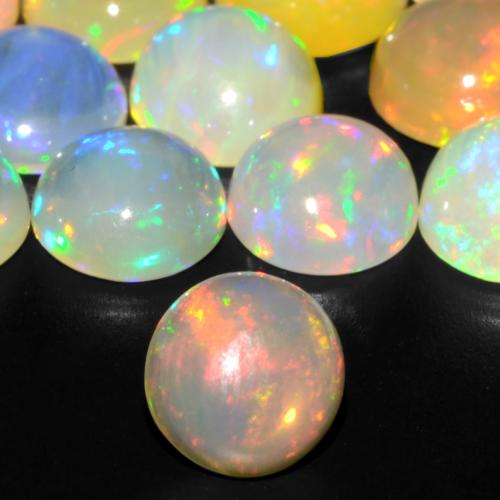 0.86 ct Multicolor Opal Gemstone, Opal Gem in Round Cabochon Shape for Sale.