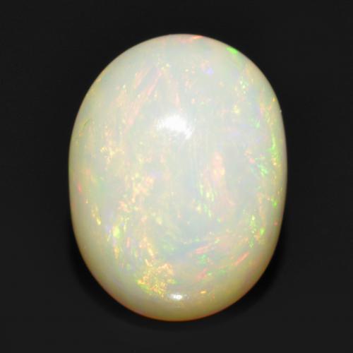 Multicolore Opale Gem - 0.8ct Ovale cabochon (ID: 563849)