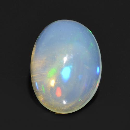 Multicolor Opal Gem - 0.7ct Oval Cabochon (ID: 564382)
