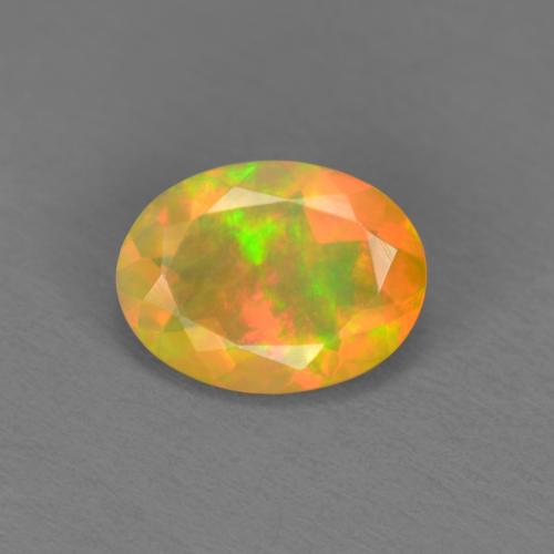 0.74 ct Multicolor Opal Gemstone, Opal Gem in Oval Facet Shape for Sale.