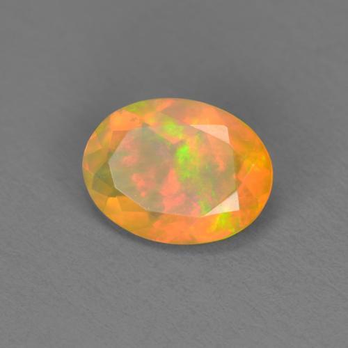 0.74 ct Multicolor Opal Stone, Natural Opal in Oval Facet Shape for Sale
