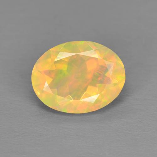 Ópalo Multicolor Forma ovalada de 8,9 x 6,9mm de Etiopía, peso de 1.05ct, piedra preciosa No tratado de forma natural en claridad Transparente, Ópalo de 1 pieza: el color es Multicolor, dureza Mohs de 5.5 - 6.5, Piedra del Zodiaco Libra, Photo A