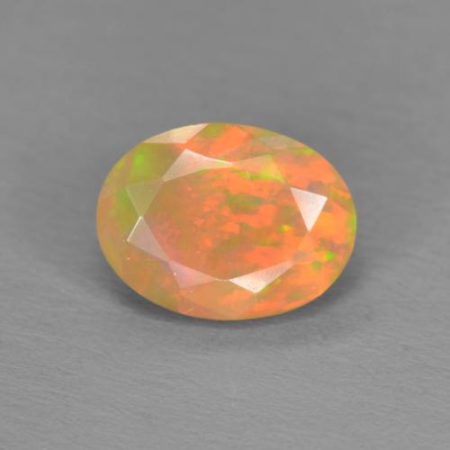 0.86 ct Multicolor Opal Gemstone, Opal Gem in Oval Facet Shape for Sale.