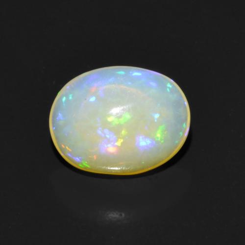 0.85ct Oval Multicolor Opal from Ethiopia, Dimension 7.9 x 6.1mm, Natural untreated Gemstone, Transparent Clarity, 1pc Oval Cabochon Opal, Mohs Hardness of 5.5 - 6.5, October Birthstone, Photo A