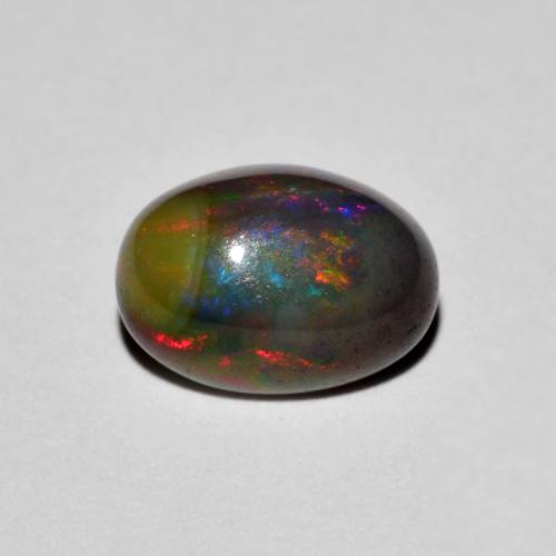 Opale Multicolore oval cabochon 8,9 x 6,5mm d'Éthiopie, poids de 1,34 ct, pierre gemme naturelle Fumé de pureté Opaque , 1 pièce d'opale , couleur : Multicolore, dureté de Mohs de 5.5 à 6.5, Symbolise l'amour, la passion, le désir, Photo A