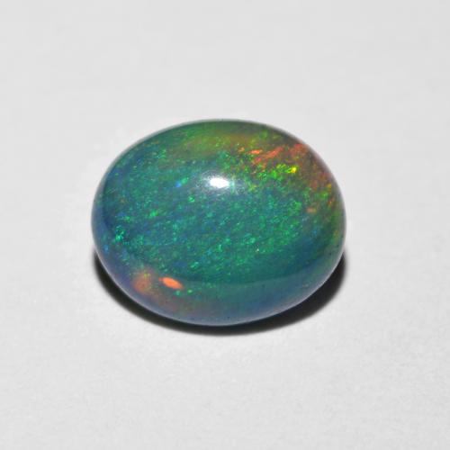 0.84ct Oval Multicolor Opal from Ethiopia, Dimension 7.8 x 6.3mm, Natural smoked Gemstone, Translucent Clarity, 1pc Oval Cabochon Opal, Mohs Hardness of 5.5 - 6.5, Year of the Snake Gemstone, Photo A