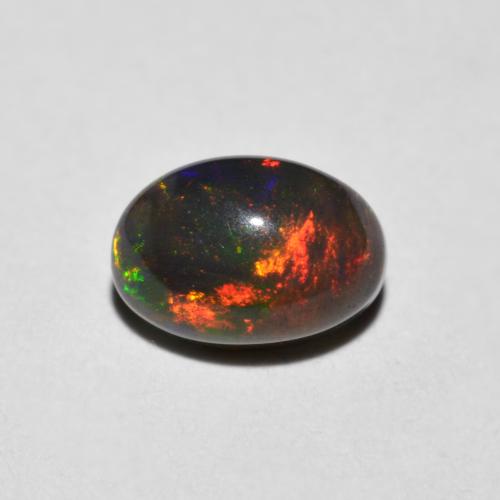 0.59ct Oval Multicolor Opal from Ethiopia, Dimension 7.1 x 5mm, Natural smoked Gemstone, Opaque Clarity, 1pc Oval Cabochon Opal, Mohs Hardness of 5.5 - 6.5, Symbolizes Love, Passion, Desire, Photo A