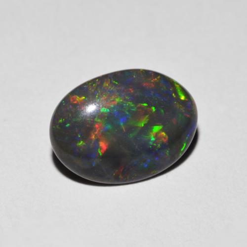 Multicolore Opale Gem - 0.6ct Ovale cabochon (ID: 615739)