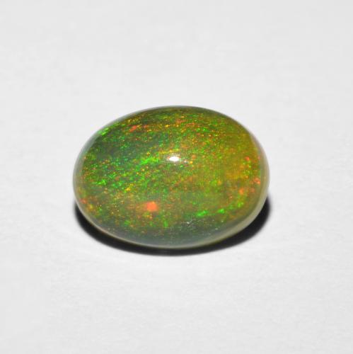 Opale Multicolore oval cabochon 8,1 x 5,9mm d'Éthiopie, poids de 1 ct, pierre gemme naturelle Fumé de pureté Transparent, 1 pièce d'opale , couleur : Multicolore, dureté de Mohs de 5.5 à 6.5, Année de la pierre précieuse du serpent, Photo A
