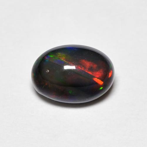 Opale Multicolore Ovale 0,55 ct d'Éthiopie, Dimension 9,7 x 5mm, Pierre gemme naturelle Fumé, pureté Opaque , 1 pièce d'opale oval cabochon, dureté de Mohs de 5.5 à 6.5, Année de la pierre précieuse du serpent, Photo A