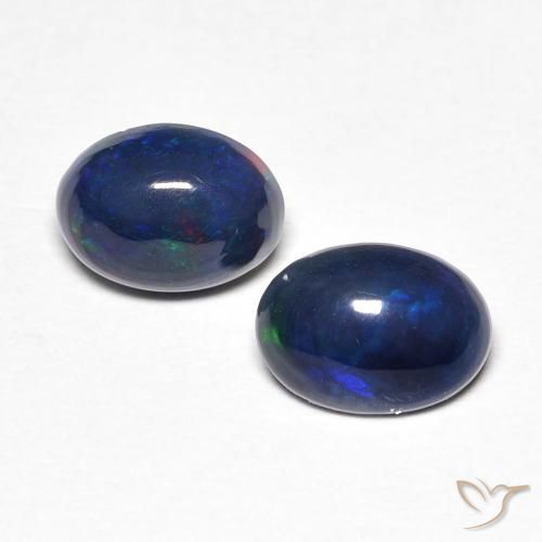 Paire d'opale Ovale 7,1 x 5,2mm - Poids total 0,83 ct / moyenne 0,42 ct chaque, pierre gemme naturelle , couleur Multicolore avec pureté Opaque , dureté Mohs 5.5 à 6.5, Pierre de Cupidon, Photo A