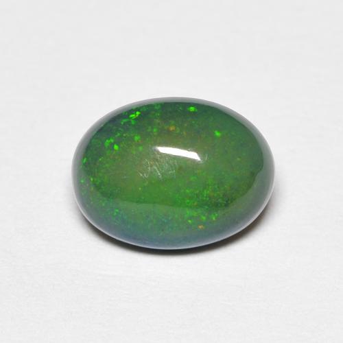8,2 x 6,1mm mehrfarbiger Opal im Oval-Cabochon Schliff aus Äthiopien, Gewicht 0,82 ct, Garantiert echter Edelstein in Opaque Reinheit, 1 Stück Opal - die Farbe ist Mehrfarbig, Mohs-Härte von 5,5 - 6,5, Symbolisiert Liebe, Leidenschaft, Verlangen, Photo A
