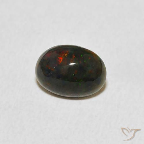0.67 ct Multicolor Opal Stone, Natural Opal in Oval Cabochon Shape for Sale