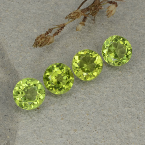 Verde amarillento intenso Peridoto Gema - 0.9ct Faceta Redonda (ID: 480505)